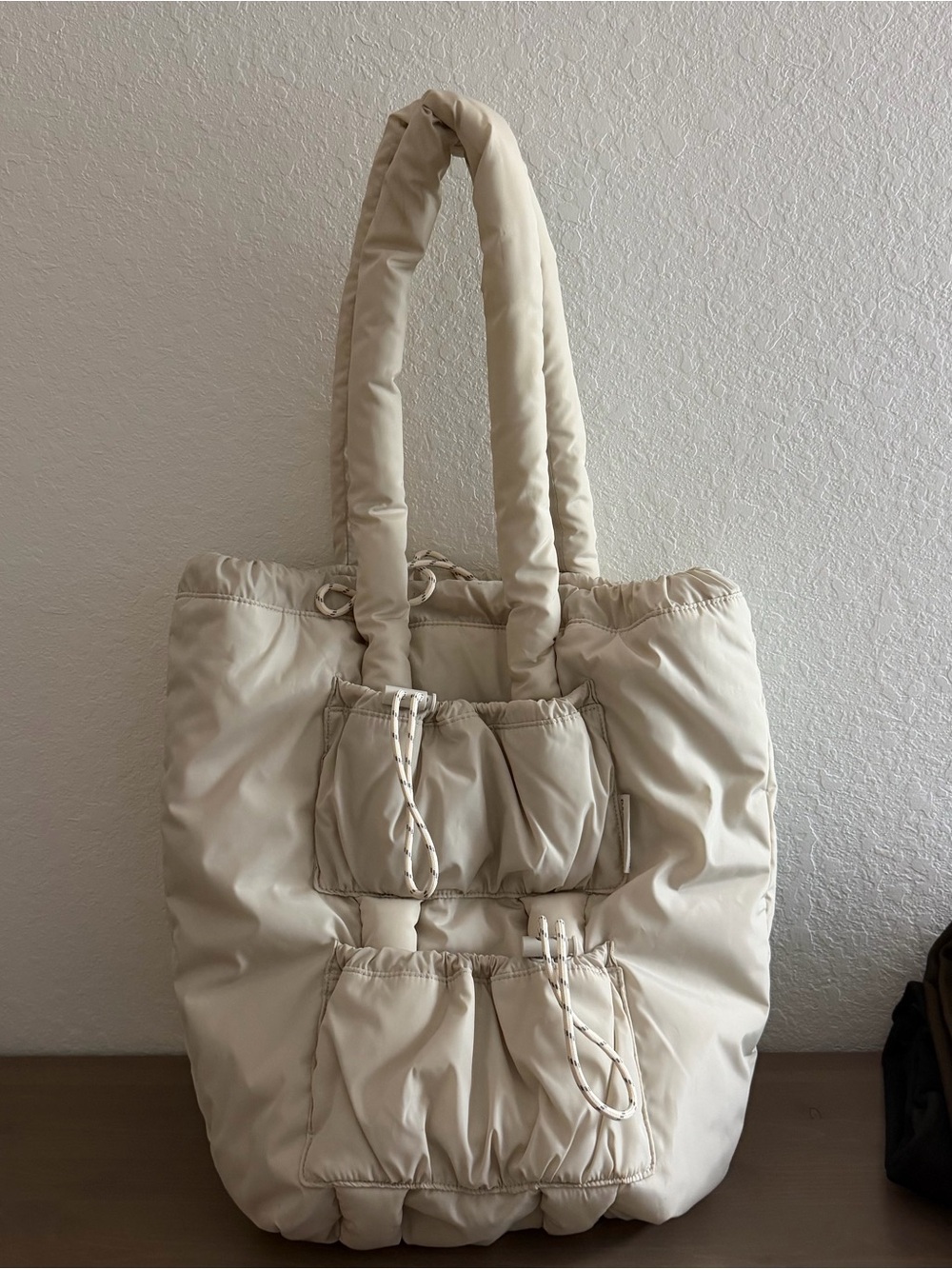 Dagne Dover Cream Drawstring Tote Bag